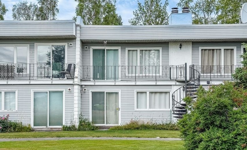 Light & Bright Highly Sought After Townhome Condo